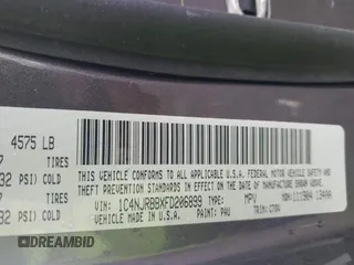2015 Jeep Patriot Sport with VIN 1C4NJRBBXFD206899, listed as a IAAI auction lot 42434469 with 150,817 mi miles and . Bid and sale history available at DreamBid. Image 9.