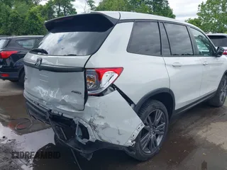 2021 Honda Passport EX-L with VIN 5FNYF8H54MB041738, listed as a IAAI auction lot 42310470 with 52,409 mi miles and . Bid and sale history available at DreamBid. Image 6.