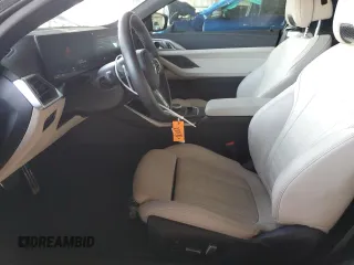 2024 BMW 4 Series M440i with VIN WBA53AT09RCN51860, listed as a Copart auction lot 67140264 with 95 mi miles and Salvage Title. Bid and sale history available at carsss.com. Image 7.