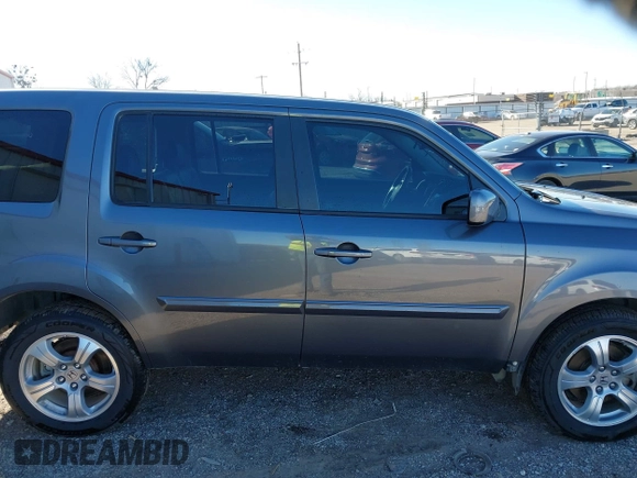 2015 Honda Pilot EX-L with VIN 5FNYF4H57FB063115, listed as a IAAI auction lot 41248234 with 187,752 mi miles and . Bid and sale history available at carsss.com. Image 13.