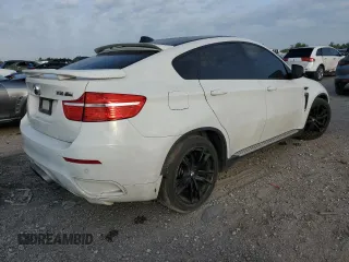 2012 BMW X6 50i z VIN 5UXFG8C59CL590549, wystawiony jako Copart lot #53071175 z przebiegiem 67 390 mil mil oraz Szkoda całkowita • Salvage title. Historia ofert i sprzedaży dostępna na DreamBid. Obrazek 3.