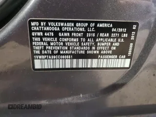 2012 Volkswagen Passat SE z VIN 1VWBP7A39CC080551, wystawiony jako Copart lot #57606895 z przebiegiem 154 965 mil mil oraz Czysty tytuł • Clean title. Historia ofert i sprzedaży dostępna na DreamBid. Obrazek 12.
