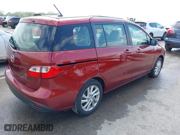2012 Mazda 5 Sport with VIN JM1CW2BL9C0107471, listed as a IAAI auction lot 42021285 with 104,851 mi miles. Bid and sale history available at carsss.com. Image 4.