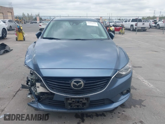 2014 Mazda 6 i Grand Touring with VIN JM1GJ1W64E1133729, listed as a IAAI auction lot 42050222 with 112,464 mi miles and . Bid and sale history available at DreamBid. Image 12.