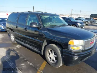 2004 GMC Yukon XL Denali with VIN 1GKFK66U14J290142, listed as a IAAI auction lot 41846973 with 204,090 mi miles. Bid and sale history available at carsss.com. Image 1.