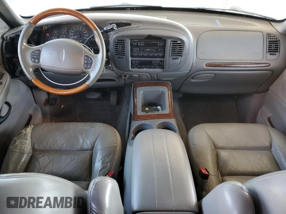 1998 Lincoln Navigator with VIN 5LMEU27L4WLJ06814, listed as a Copart auction lot 87290504 with 204,185 mi miles and Salvage title. Bid and sale history available at DreamBid. Image 8.