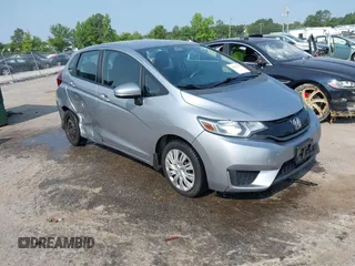 2017 Honda Fit LX z VIN 3HGGK5H50HM705123, wystawiony jako IAAI lot #42427270 z przebiegiem 328 978 mil mil oraz . Historia ofert i sprzedaży dostępna na DreamBid. Obrazek 1.