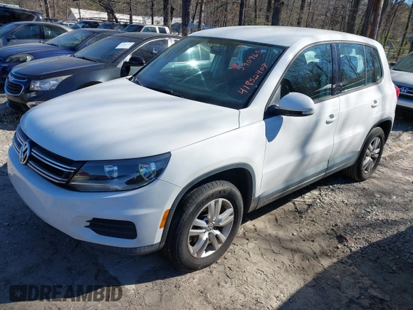 2012 Volkswagen Tiguan SE with VIN WVGAV7AX9CW590965, listed as a IAAI auction lot 41852407 with 153,953 mi miles and . Bid and sale history available at DreamBid. Image 2.