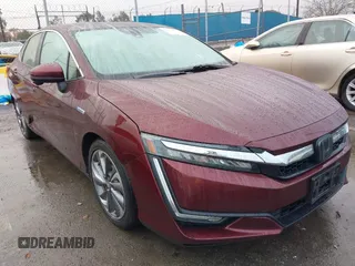 2018 Honda Clarity z VIN JHMZC5F13JC015103, wystawiony jako IAAI lot #41522130 z przebiegiem 111 634 mil mil oraz . Historia ofert i sprzedaży dostępna na DreamBid. Obrazek 1.