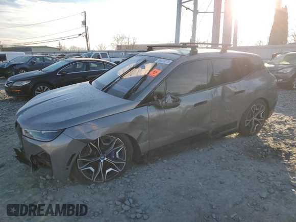 2023 BMW iX M60 with VIN WB533CF08PCK44321, listed as a Copart auction lot 88594075 with 13,829 mi miles and Salvage Title. Bid and sale history available at carsss.com. Image 1.