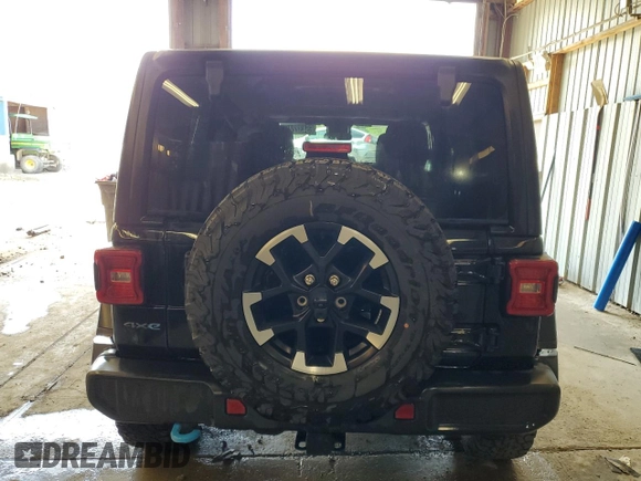 2024 Jeep Wrangler Rubicon with VIN 1C4RJXR67RW269269, listed as a Copart auction lot 65432245 with 25,054 mi miles and Clean title. Bid and sale history available at DreamBid. Image 6.