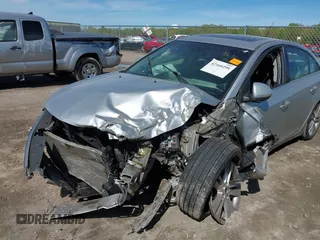 2011 Chevrolet Cruze LTZ z VIN 1G1PH5S9XB7141998, wystawiony jako IAAI lot #42160299 z przebiegiem Nie podano mil oraz . Historia ofert i sprzedaży dostępna na DreamBid. Obrazek 6.