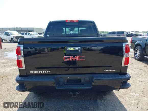 2015 GMC Sierra 1500 Denali z VIN 3GTU2WEJ9FG386812, wystawiony jako IAAI lot #42381651 z przebiegiem 138 009 mil mil oraz . Historia ofert i sprzedaży dostępna na DreamBid. Obrazek 16.