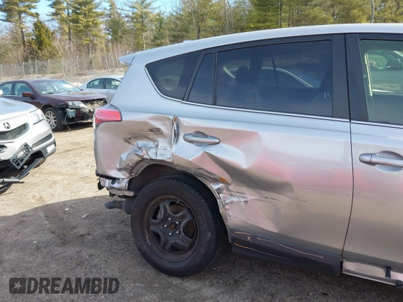 2018 Toyota RAV4 LE with VIN JTMBFREV8JJ224872, listed as a IAAI auction lot 41907962 with 104,605 mi miles and . Bid and sale history available at DreamBid. Image 6.