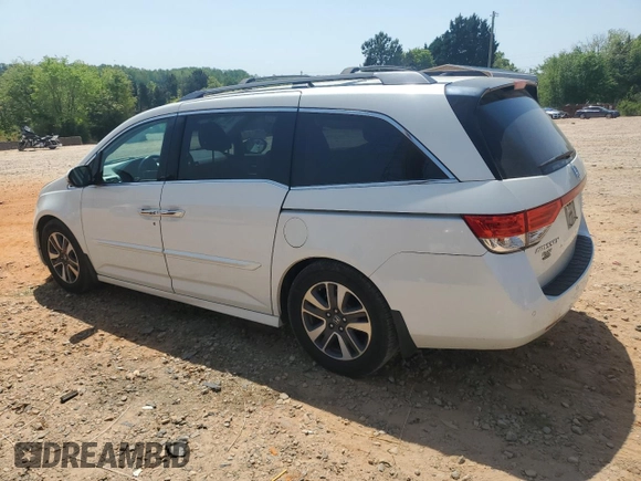 2016 Honda Odyssey Touring Elite with VIN 5FNRL5H94GB109829, listed as a Copart auction lot 52583225 with 70,740 mi miles and Salvage Title. Bid and sale history available at carsss.com. Image 2.