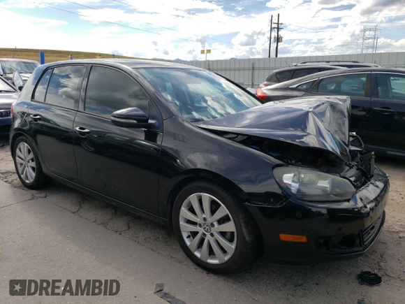 2012 Volkswagen Golf TDI with VIN WVWNM7AJ9CW148367, listed as a Copart auction lot 69002904 with 77,987 mi miles and Salvage title. Bid and sale history available at DreamBid. Image 4.