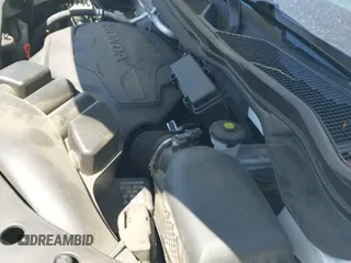 2021 Honda Pilot Touring 8-Passenger z VIN 5FNYF5H98MB037807, wystawiony jako IAAI lot #42136047 z przebiegiem 80 990 mil mil oraz . Historia ofert i sprzedaży dostępna na DreamBid. Obrazek 20.