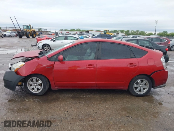 2007 Toyota Prius z VIN JTDKB20U977687630, wystawiony jako IAAI lot #41939185 z przebiegiem 392 988 mil mil oraz . Historia ofert i sprzedaży dostępna na DreamBid. Obrazek 14.