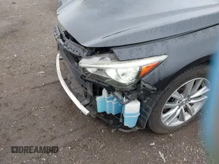 2014 Infiniti Q50 Premium z VIN JN1BV7AR2EM705630, wystawiony jako IAAI lot #42258650 z przebiegiem 109 151 mil mil oraz . Historia ofert i sprzedaży dostępna na DreamBid. Obrazek 19.