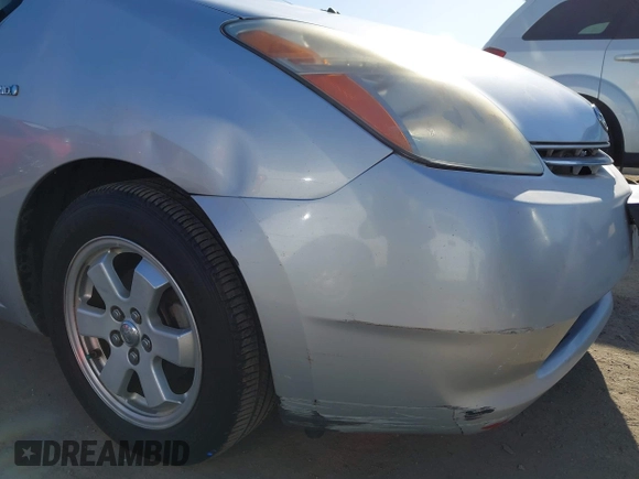 2007 Toyota Prius z VIN JTDKB20U477567380, wystawiony jako IAAI lot #42323632 z przebiegiem 193 349 mil mil oraz . Historia ofert i sprzedaży dostępna na DreamBid. Obrazek 6.