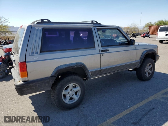 2000 Jeep Cherokee SE with VIN 1J4FF27SXYL140055, listed as a Copart auction lot 70315454 with 176,017 mi miles and Salvage title. Bid and sale history available at DreamBid. Image 3.
