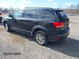 2015 Dodge Journey SXT with VIN 3C4PDDBG6FT561173, listed as a IAAI auction lot 41869022 with 185,106 mi miles and . Bid and sale history available at DreamBid. Image 3.