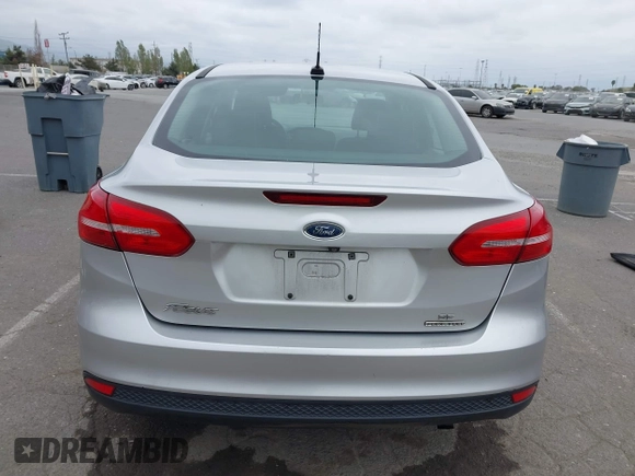 2015 Ford Focus SE z VIN 1FADP3F21FL218369, wystawiony jako IAAI lot #42126986 z przebiegiem 99 844 mil mil oraz . Historia ofert i sprzedaży dostępna na DreamBid. Obrazek 16.