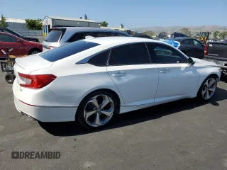 2018 Honda Accord Touring with VIN 1HGCV1F9XJA018710, listed as a Copart auction lot 56143685 with 146,625 mi miles and Salvage title. Bid and sale history available at DreamBid. Image 3.