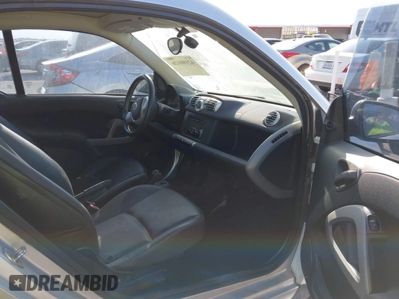 2015 Smart fortwo Passion with VIN WMEEJ3BA4FK800163, listed as a IAAI auction lot 42180126 with 53,138 mi miles. Bid and sale history available at carsss.com. Image 5.