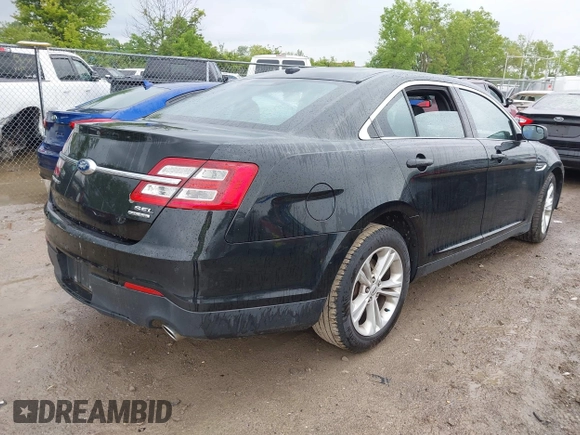 2015 Ford Taurus SEL z VIN 1FAHP2E86FG172631, wystawiony jako IAAI lot #42307630 z przebiegiem 95 184 mil mil oraz . Historia ofert i sprzedaży dostępna na DreamBid. Obrazek 4.