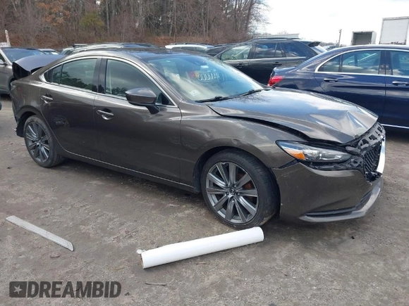 2018 Mazda Mazda6 Touring with VIN JM1GL1VM5J1309174, listed as a IAAI auction lot 41730175 with 107,423 mi miles. Bid and sale history available at carsss.com. Image 1.