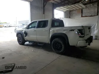 2022 Nissan Frontier Pro-4X z VIN 1N6ED1EK9NN692552, wystawiony jako Copart lot #55795375 z przebiegiem 29 171 mil mil oraz Szkoda całkowita • Salvage title. Historia ofert i sprzedaży dostępna na DreamBid. Obrazek 2.