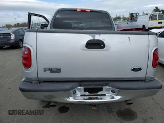 2002 Ford F-150 XLT with VIN 1FTRW07602KE38959, listed as a Copart auction lot 50547095 with 160,908 mi miles and Salvage Title. Bid and sale history available at carsss.com. Image 6.