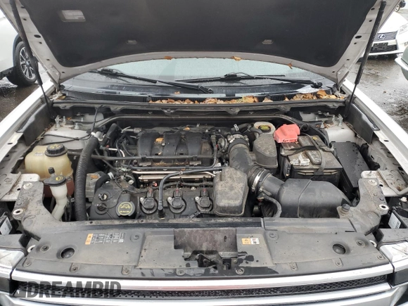2015 Ford Flex Limited z VIN 2FMHK6D89FBA02963, wystawiony jako Copart lot #85285054 z przebiegiem 84 865 mil mil oraz Szkoda całkowita • Salvage title. Historia ofert i sprzedaży dostępna na DreamBid. Obrazek 11.