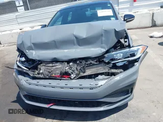 2019 Volkswagen Jetta GLI S z VIN 3VW6T7BU9KM153175, wystawiony jako IAAI lot #42099719 z przebiegiem 90 608 mil mil oraz . Historia ofert i sprzedaży dostępna na DreamBid. Obrazek 12.