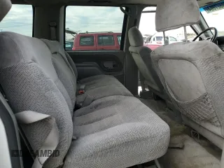 1996 Chevrolet Suburban with VIN 3GNEC16R5TG149147, listed as a Copart auction lot 84827204 with 320,305 mi miles and Salvage title. Bid and sale history available at DreamBid. Image 12.