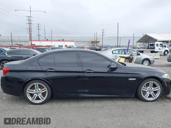 2015 BMW 5 Series 535i with VIN WBA5B1C55FG128387, listed as a IAAI auction lot 41885806 with 94,734 mi miles and . Bid and sale history available at carsss.com. Image 18.