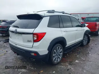2019 Honda Passport Elite with VIN 5FNYF8H0XKB005151, listed as a IAAI auction lot 42322644 with 124,274 mi miles and . Bid and sale history available at DreamBid. Image 4.