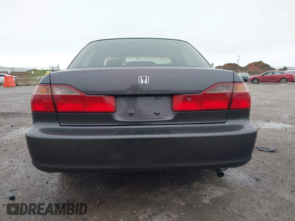 1999 Honda Accord LX with VIN 1HGCG5647XA154131, listed as a IAAI auction lot 41962701 with 126,673 mi miles and . Bid and sale history available at DreamBid. Image 16.