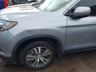2016 Honda Pilot EX-L with VIN 5FNYF5H53GB040003, listed as a IAAI auction lot 41452374 with Not Provided miles and . Bid and sale history available at DreamBid. Image 6.