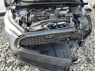 2023 Toyota Corolla Cross XLE with VIN 7MUDAABG6PV078570, listed as a Copart auction lot 65246535 with 21,928 mi miles and Salvage title. Bid and sale history available at DreamBid. Image 12.