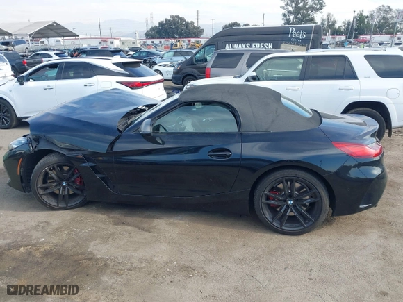 2022 BMW Z4 sDriveM40i with VIN WBAHF9C08NWX88691, listed as a IAAI auction lot 40983519 with 11,108 mi miles. Bid and sale history available at carsss.com. Image 14.