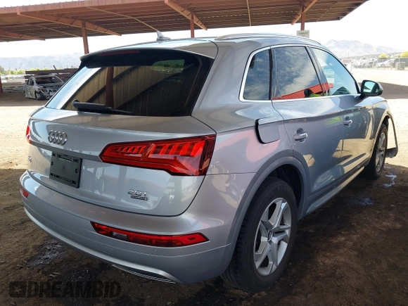 2018 Audi Q5 Premium Plus z VIN WA1BNAFY9J2055656, wystawiony jako IAAI lot #42187509 z przebiegiem 74 572 mil mil oraz . Historia ofert i sprzedaży dostępna na DreamBid. Obrazek 4.