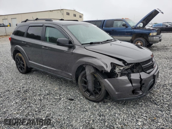 2015 Dodge Journey SXT with VIN 3C4PDCCG1FT753996, listed as a Copart auction lot 72997784 with 110,430 mi miles and Salvage title. Bid and sale history available at DreamBid. Image 4.