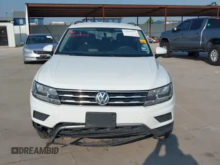 2018 Volkswagen Tiguan S with VIN 3VV1B7AX1JM119971, listed as a IAAI auction lot 42039977 with 108,932 mi miles and . Bid and sale history available at DreamBid. Image 12.