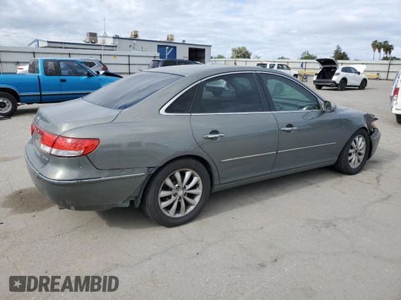 2006 Hyundai Azera SE z VIN KMHFC46F76A054625, wystawiony jako Copart lot #56588315 z przebiegiem 178 667 mil mil oraz Szkoda całkowita • Salvage title. Historia ofert i sprzedaży dostępna na DreamBid. Obrazek 3.