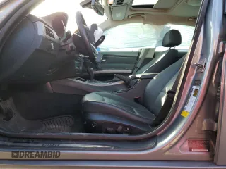 2010 BMW 3 Series 335i xDrive with VIN WBAPL3C57AA407952, listed as a Copart auction lot 85510004 with 128,631 mi miles and Salvage title. Bid and sale history available at DreamBid. Image 7.