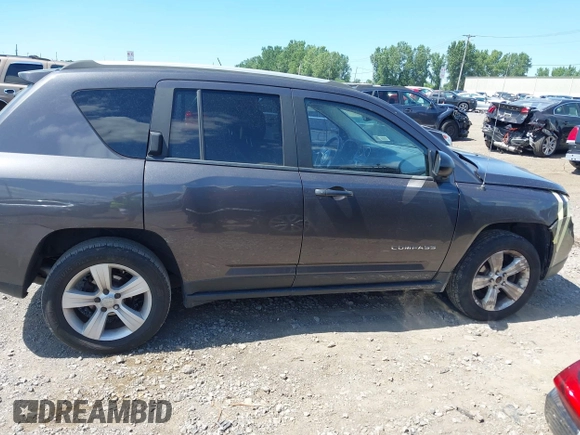 2017 Jeep Compass Sport SE z VIN 1C4NJDBB3HD143859, wystawiony jako IAAI lot #42784214 z przebiegiem 82 815 mil mil oraz . Historia ofert i sprzedaży dostępna na DreamBid. Obrazek 14.