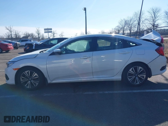 2017 Honda Civic Sedan EX-L with VIN 2HGFC1F70HH651956, listed as a IAAI auction lot 41754511 with 129,385 mi miles. Bid and sale history available at carsss.com. Image 14.