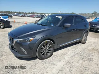 2016 Mazda CX-3 Grand Touring with VIN JM1DKBD7XG0109347, listed as a Copart auction lot 48655745 with 103,674 mi miles and Salvage Title. Bid and sale history available at carsss.com. Image 1.